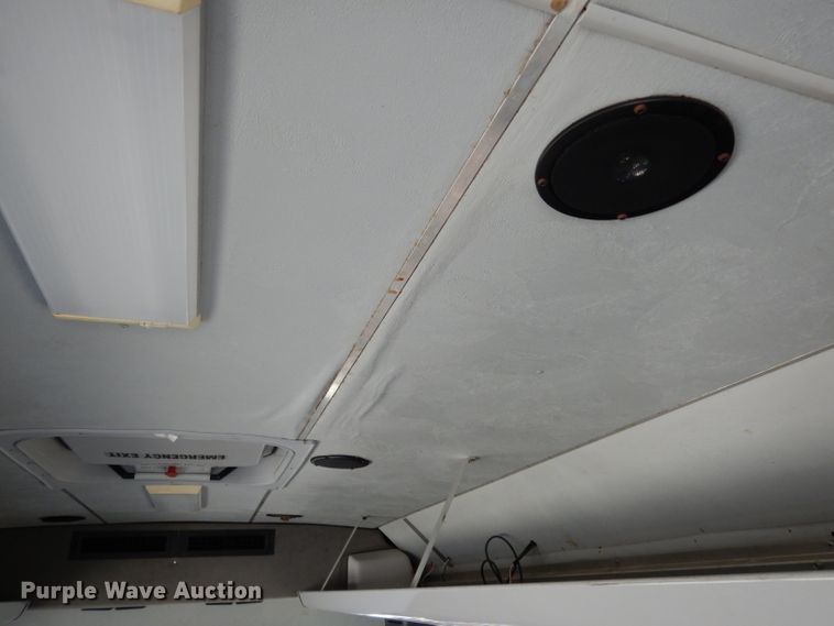 image for item DG6283 2005 GMC C5500 shuttle bus