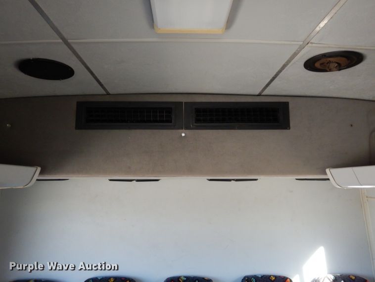 image for item DG6283 2005 GMC C5500 shuttle bus