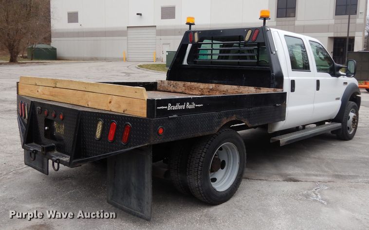 image for item DG6357 2006 Ford F450 Super Duty XL Crew Cab flatbed truck