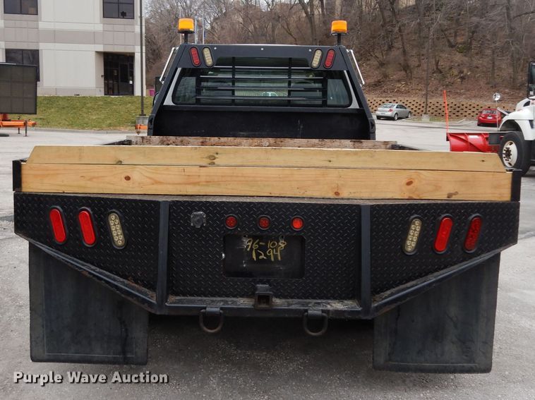 image for item DG6357 2006 Ford F450 Super Duty XL Crew Cab flatbed truck