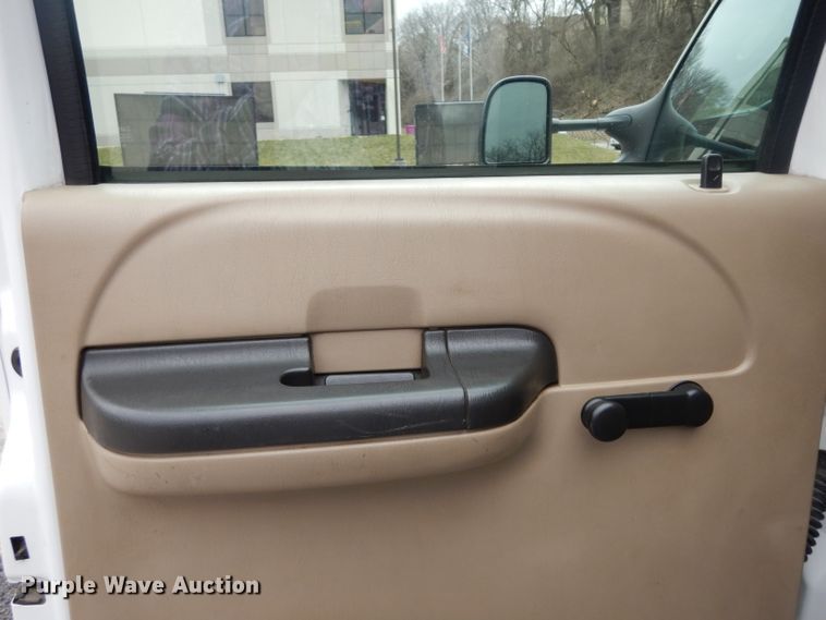 image for item DG6357 2006 Ford F450 Super Duty XL Crew Cab flatbed truck