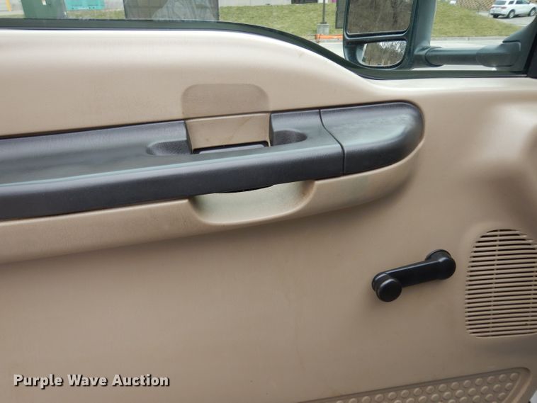 image for item DG6357 2006 Ford F450 Super Duty XL Crew Cab flatbed truck