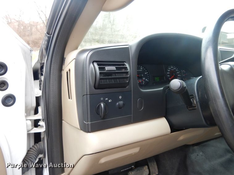 image for item DG6357 2006 Ford F450 Super Duty XL Crew Cab flatbed truck