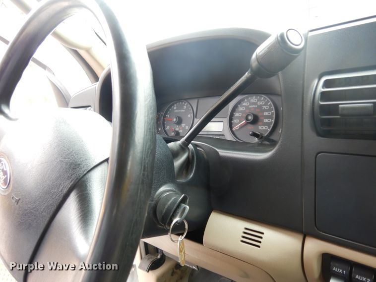 image for item DG6357 2006 Ford F450 Super Duty XL Crew Cab flatbed truck