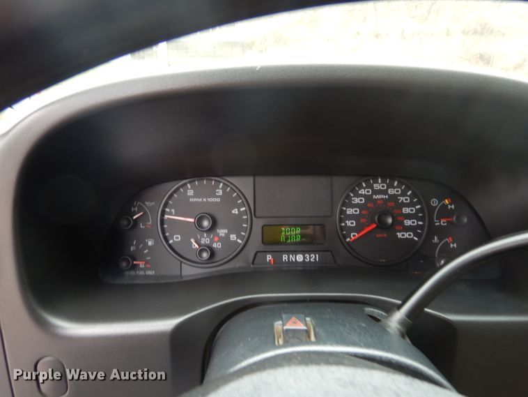 image for item DG6357 2006 Ford F450 Super Duty XL Crew Cab flatbed truck