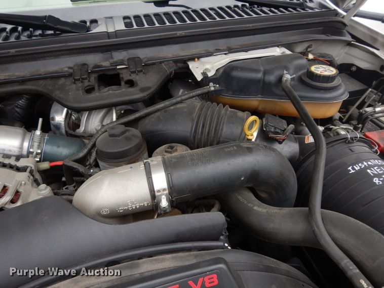 image for item DG6357 2006 Ford F450 Super Duty XL Crew Cab flatbed truck