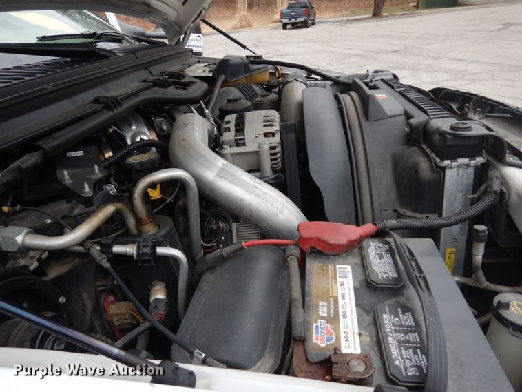 image for item DG6357 2006 Ford F450 Super Duty XL Crew Cab flatbed truck