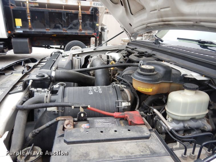 image for item DG6357 2006 Ford F450 Super Duty XL Crew Cab flatbed truck