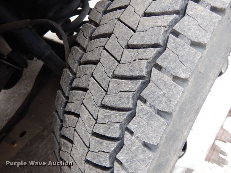 image for item DG6357 2006 Ford F450 Super Duty XL Crew Cab flatbed truck