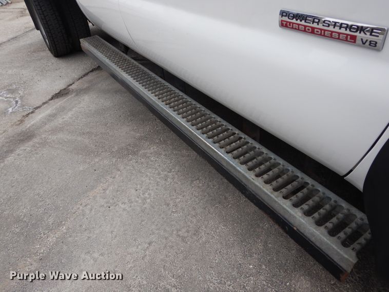 image for item DG6357 2006 Ford F450 Super Duty XL Crew Cab flatbed truck