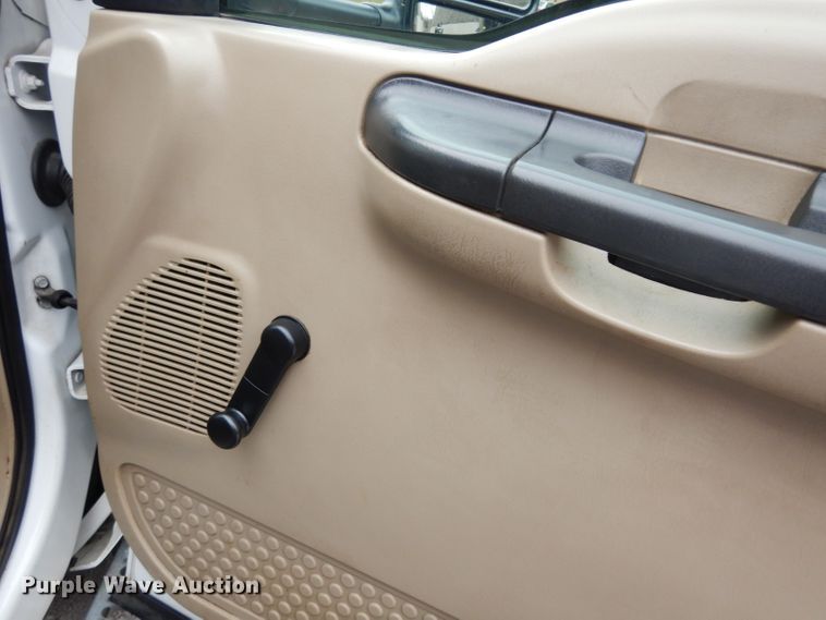 image for item DG6357 2006 Ford F450 Super Duty XL Crew Cab flatbed truck