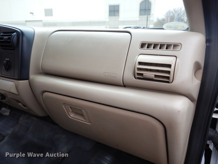 image for item DG6357 2006 Ford F450 Super Duty XL Crew Cab flatbed truck