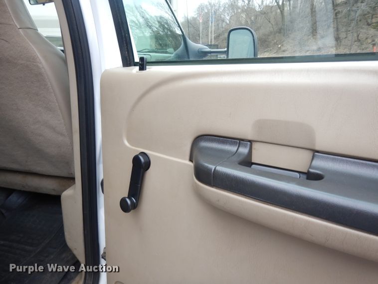 image for item DG6357 2006 Ford F450 Super Duty XL Crew Cab flatbed truck