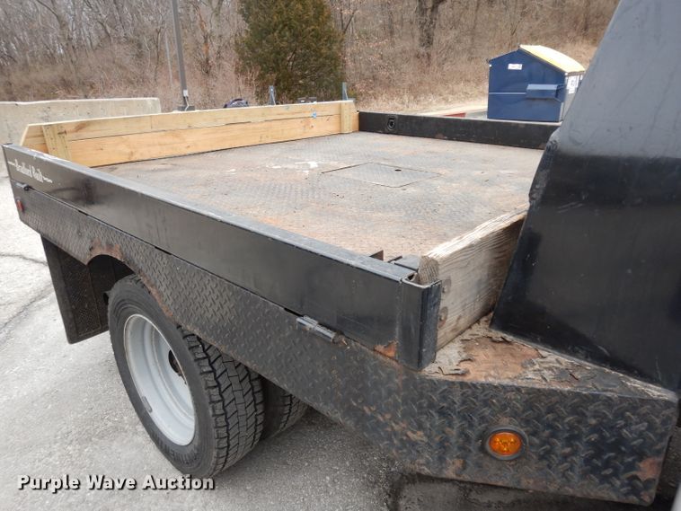 image for item DG6357 2006 Ford F450 Super Duty XL Crew Cab flatbed truck