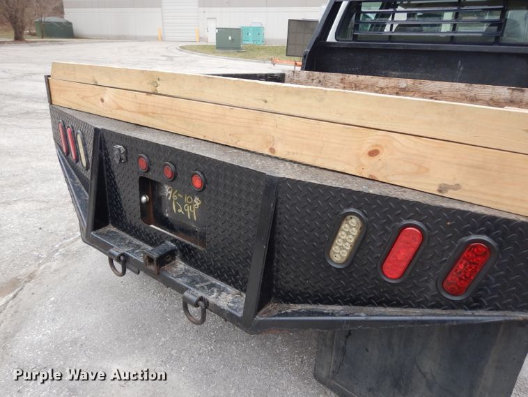 image for item DG6357 2006 Ford F450 Super Duty XL Crew Cab flatbed truck
