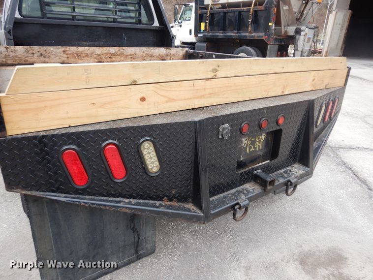image for item DG6357 2006 Ford F450 Super Duty XL Crew Cab flatbed truck