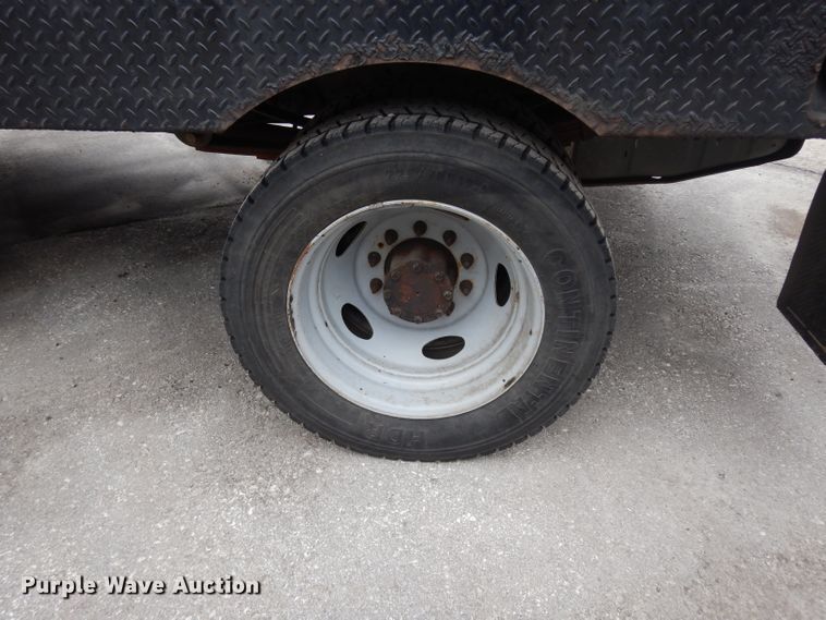 image for item DG6357 2006 Ford F450 Super Duty XL Crew Cab flatbed truck