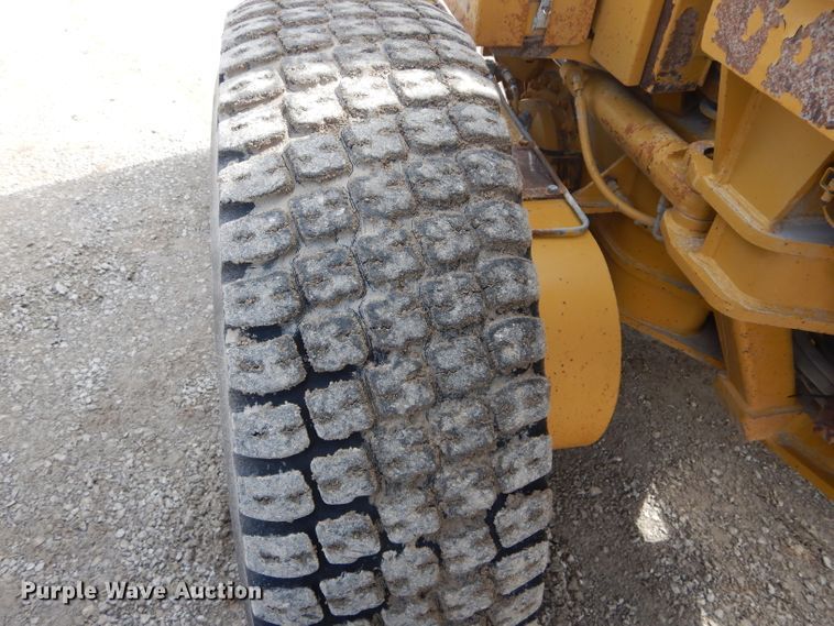 image for item DH6490 1999 Caterpillar 140H motor grader