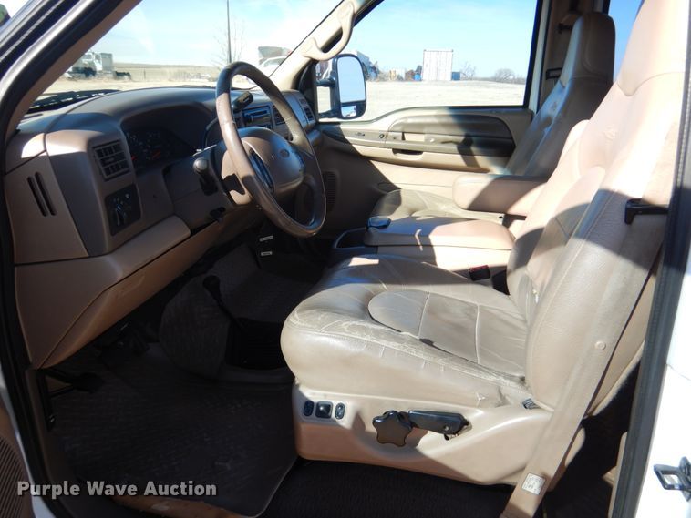 image for item DF7376 1999 Ford F450 Super Duty XLT Crew Cab flatbed truck