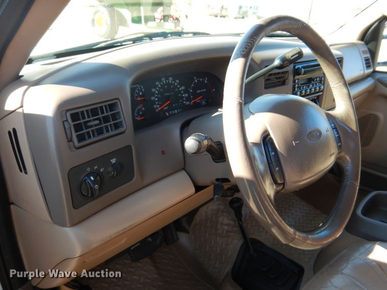 image for item DF7376 1999 Ford F450 Super Duty XLT Crew Cab flatbed truck