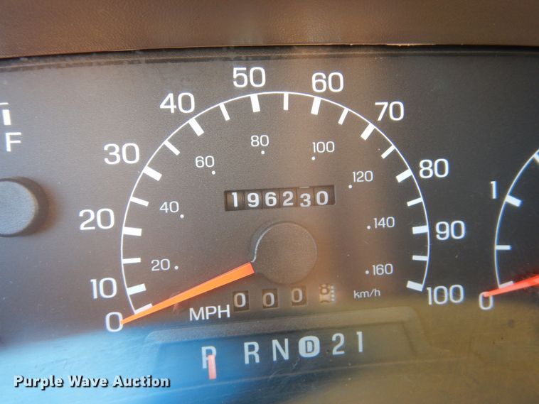 image for item DF7376 1999 Ford F450 Super Duty XLT Crew Cab flatbed truck