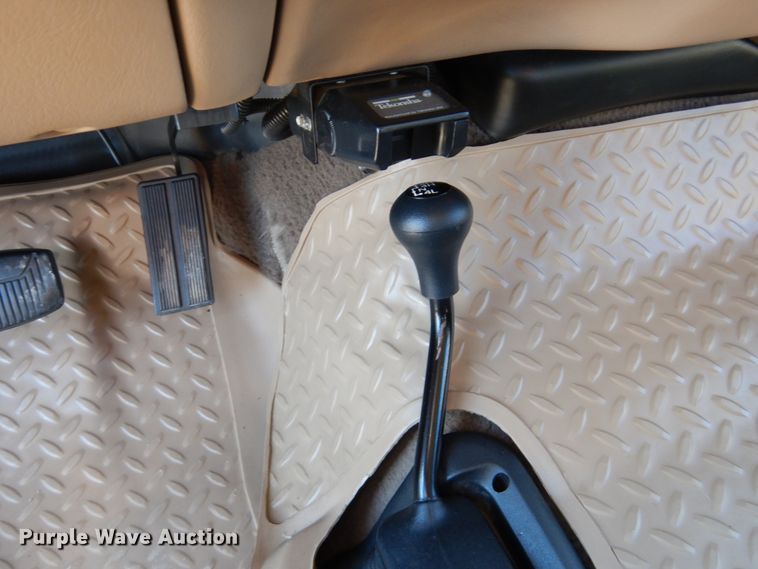 image for item DF7376 1999 Ford F450 Super Duty XLT Crew Cab flatbed truck