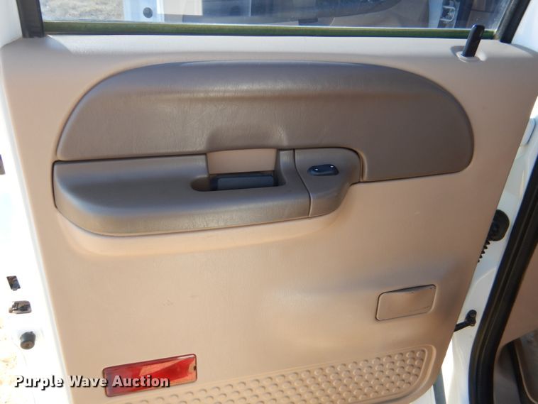 image for item DF7376 1999 Ford F450 Super Duty XLT Crew Cab flatbed truck