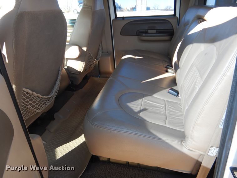 image for item DF7376 1999 Ford F450 Super Duty XLT Crew Cab flatbed truck