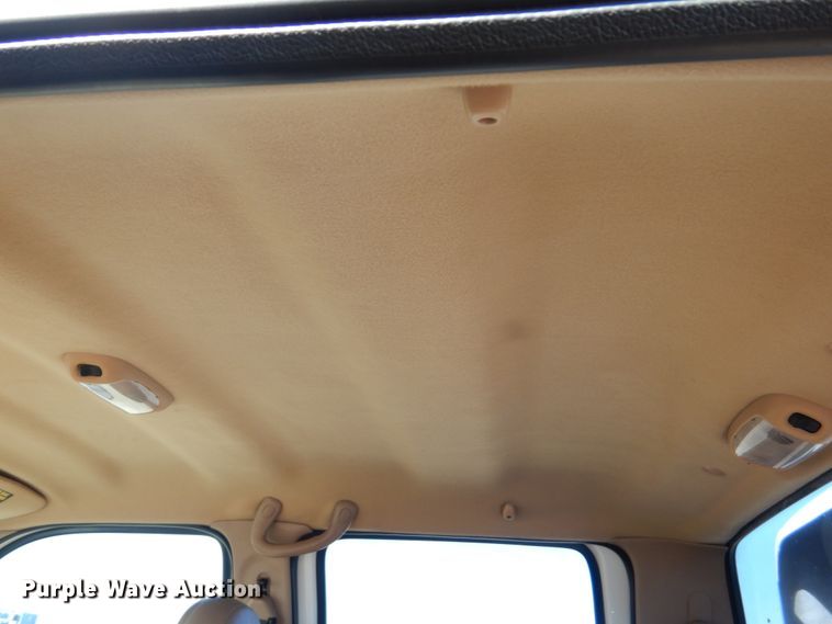 image for item DF7376 1999 Ford F450 Super Duty XLT Crew Cab flatbed truck