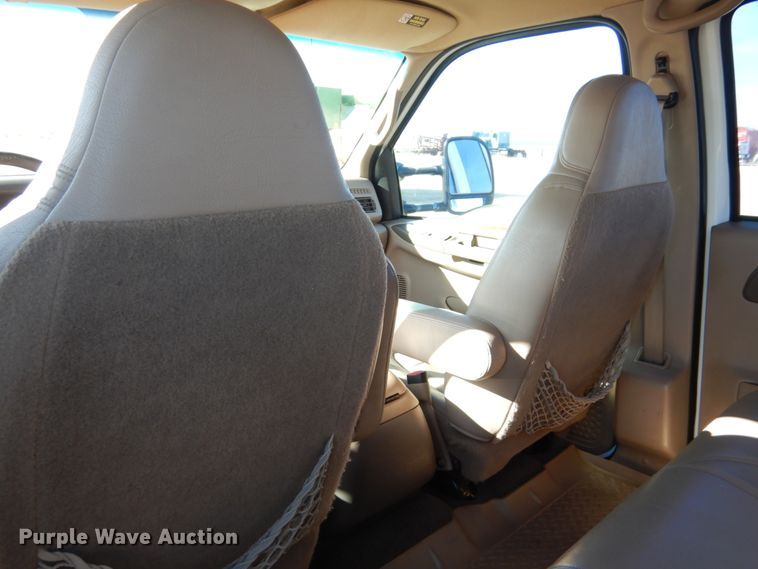 image for item DF7376 1999 Ford F450 Super Duty XLT Crew Cab flatbed truck