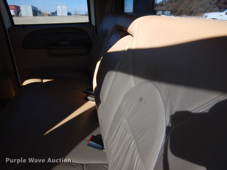 image for item DF7376 1999 Ford F450 Super Duty XLT Crew Cab flatbed truck