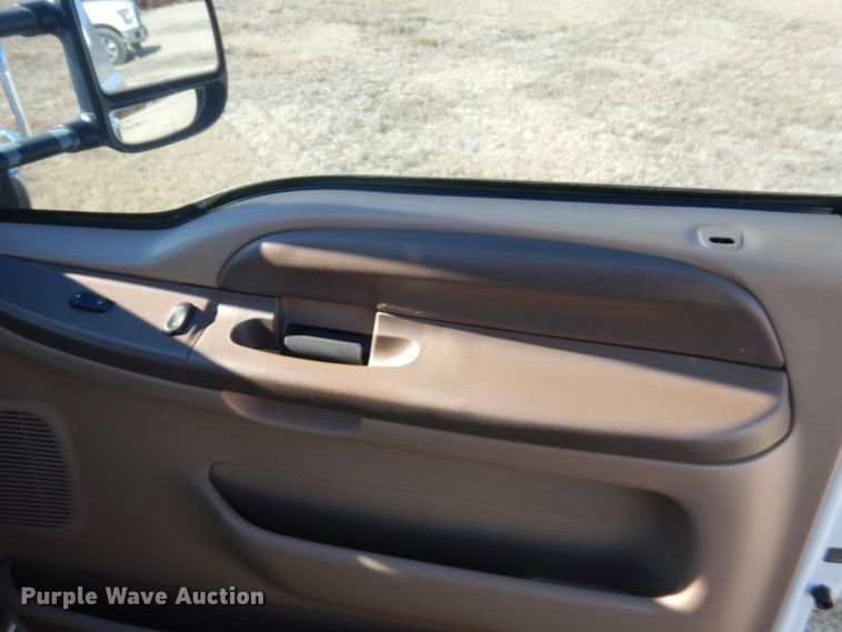 image for item DF7376 1999 Ford F450 Super Duty XLT Crew Cab flatbed truck