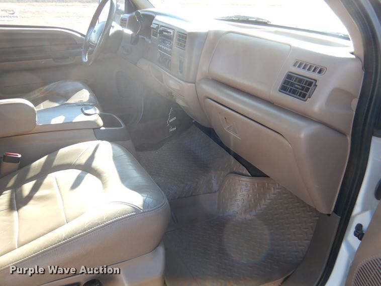 image for item DF7376 1999 Ford F450 Super Duty XLT Crew Cab flatbed truck