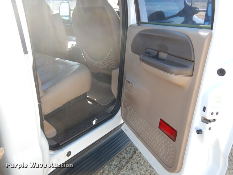 image for item DF7376 1999 Ford F450 Super Duty XLT Crew Cab flatbed truck