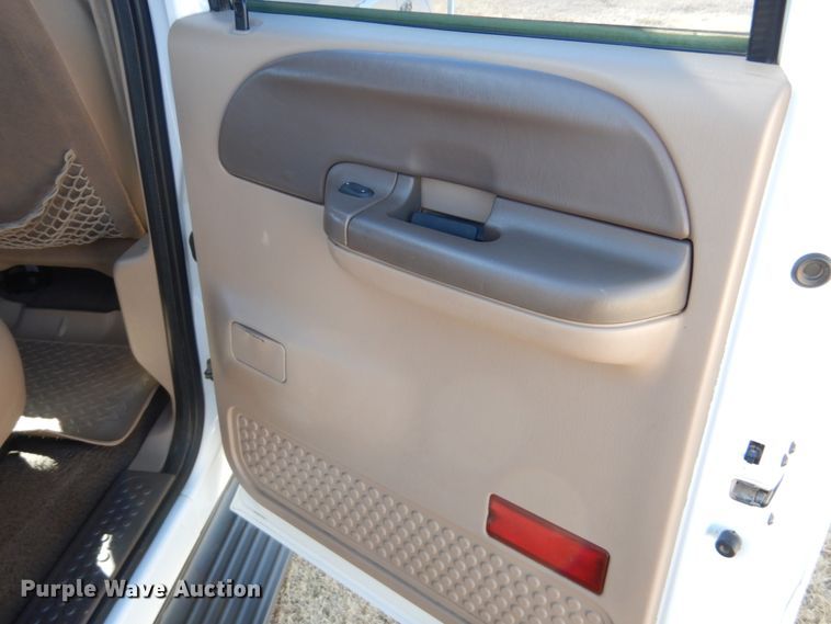 image for item DF7376 1999 Ford F450 Super Duty XLT Crew Cab flatbed truck