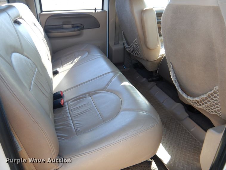 image for item DF7376 1999 Ford F450 Super Duty XLT Crew Cab flatbed truck