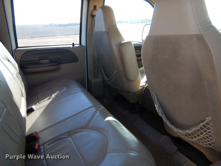 image for item DF7376 1999 Ford F450 Super Duty XLT Crew Cab flatbed truck