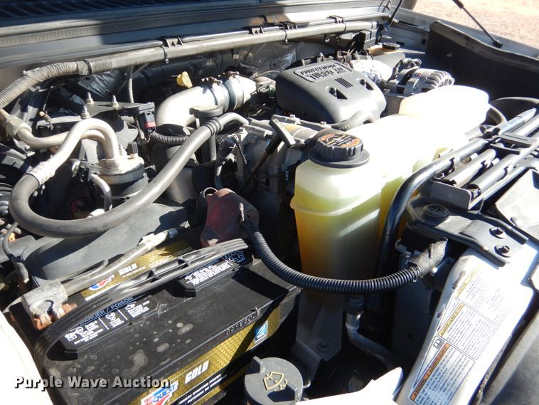 image for item DF7376 1999 Ford F450 Super Duty XLT Crew Cab flatbed truck