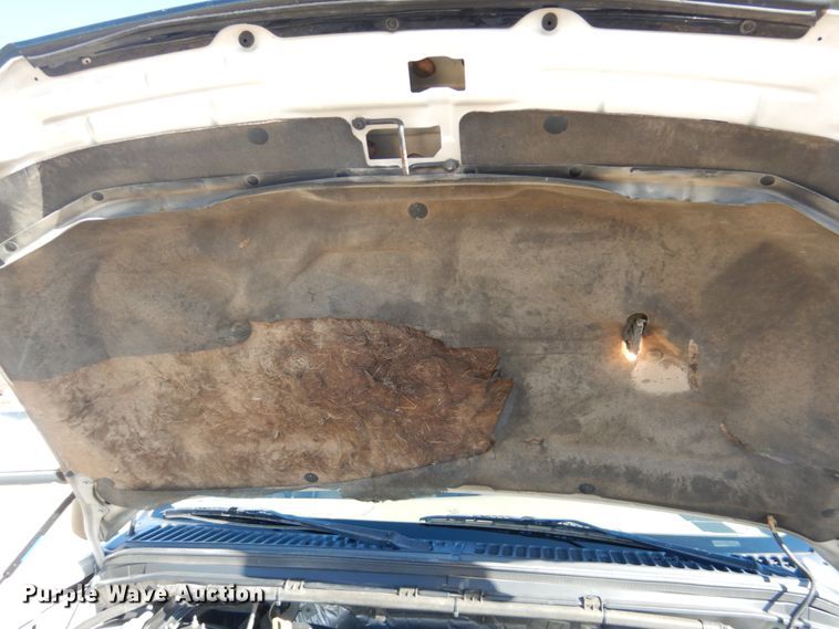 image for item DF7376 1999 Ford F450 Super Duty XLT Crew Cab flatbed truck