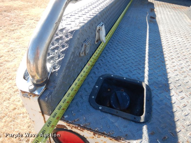 image for item DF7376 1999 Ford F450 Super Duty XLT Crew Cab flatbed truck