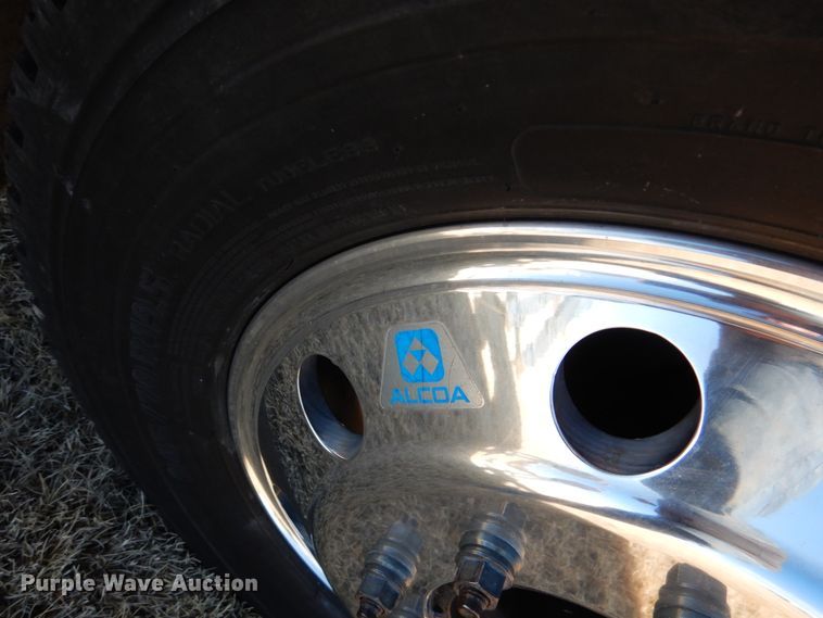 image for item DF7376 1999 Ford F450 Super Duty XLT Crew Cab flatbed truck