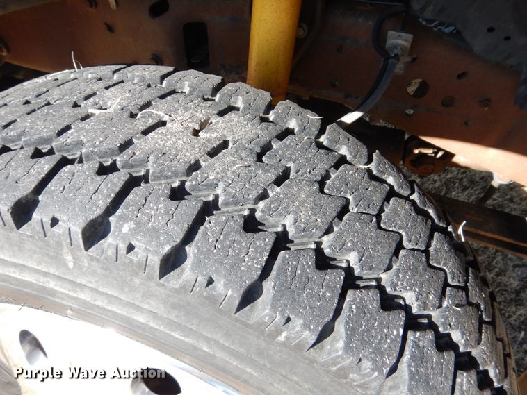 image for item DF7376 1999 Ford F450 Super Duty XLT Crew Cab flatbed truck