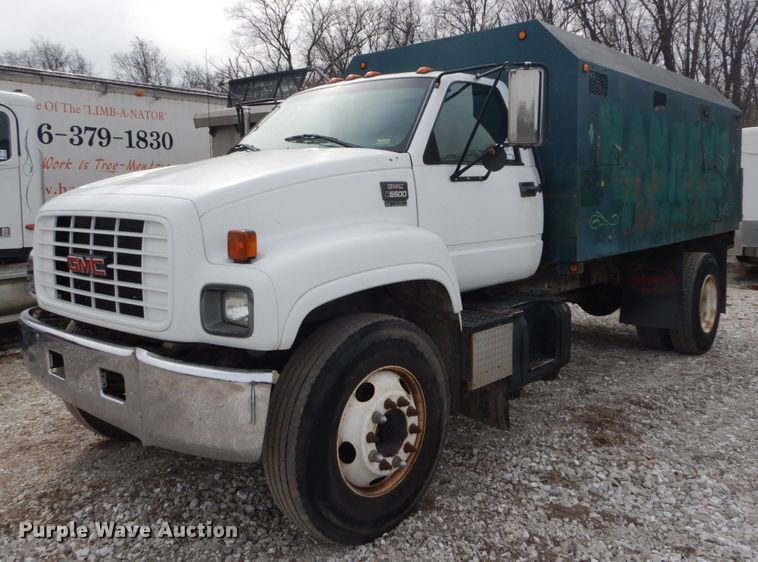 image for item DH5093 1999 GMC C6500 chip bed truck