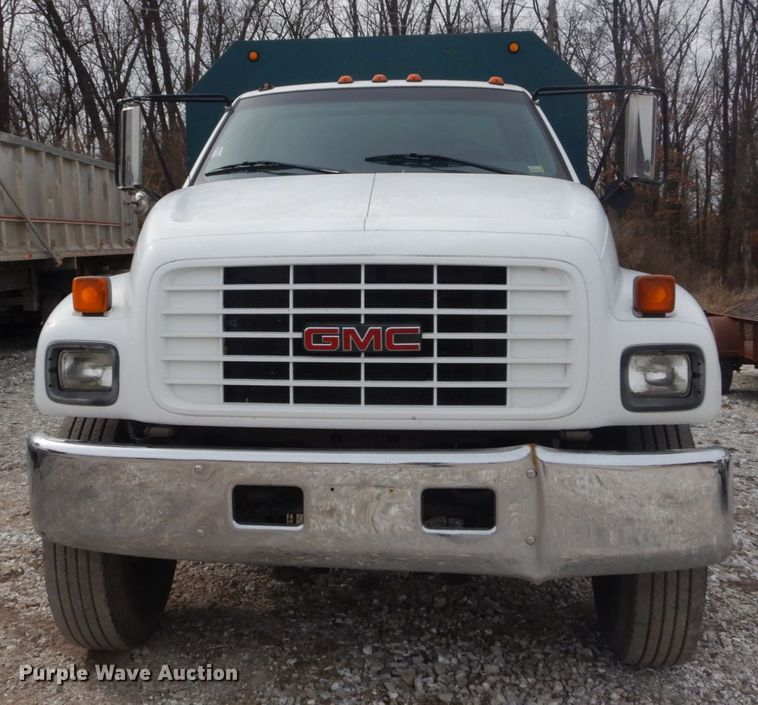 image for item DH5093 1999 GMC C6500 chip bed truck