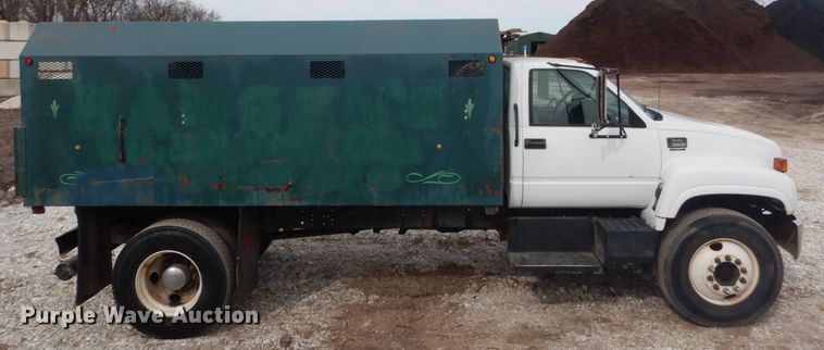 image for item DH5093 1999 GMC C6500 chip bed truck