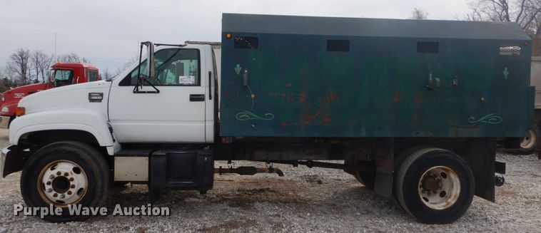 image for item DH5093 1999 GMC C6500 chip bed truck