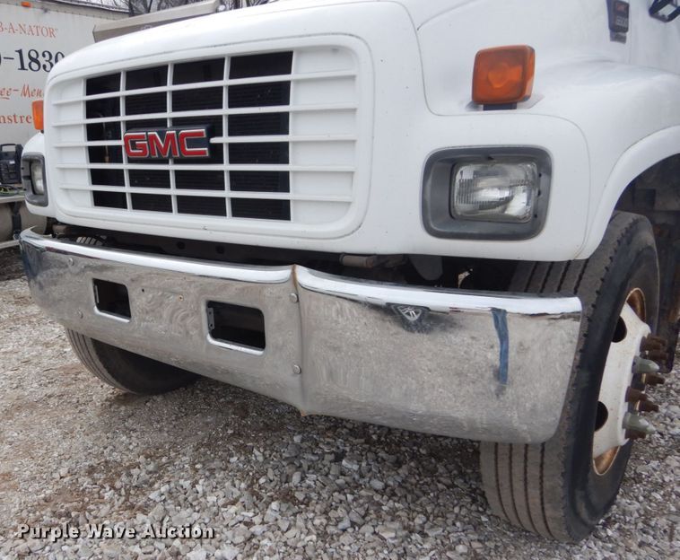 image for item DH5093 1999 GMC C6500 chip bed truck