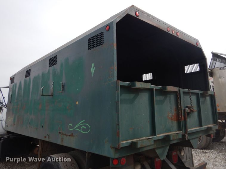 image for item DH5093 1999 GMC C6500 chip bed truck