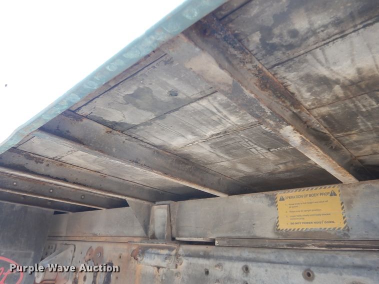 image for item DH5093 1999 GMC C6500 chip bed truck