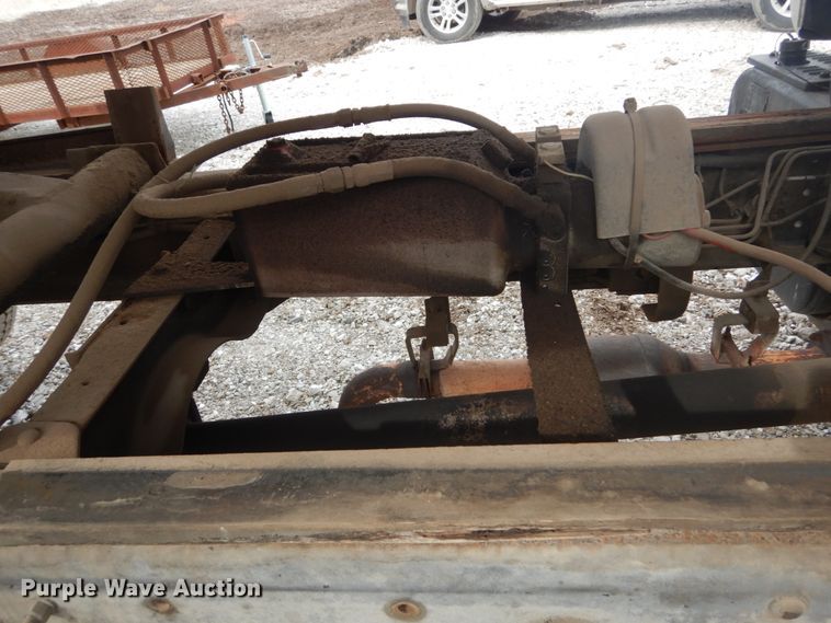 image for item DH5093 1999 GMC C6500 chip bed truck